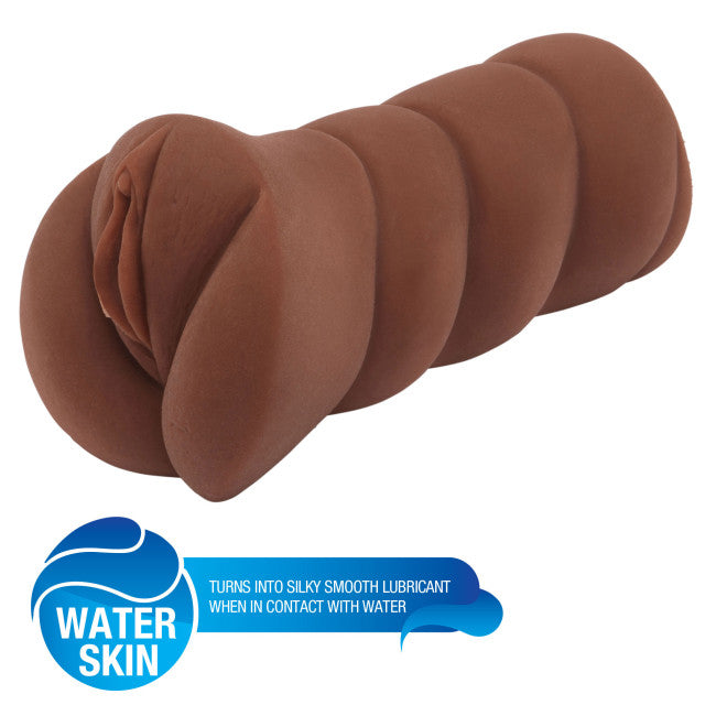 Vue de trois quart de la vaginette vulve réaliste brune avec orifice vaginal réaliste et finition souple