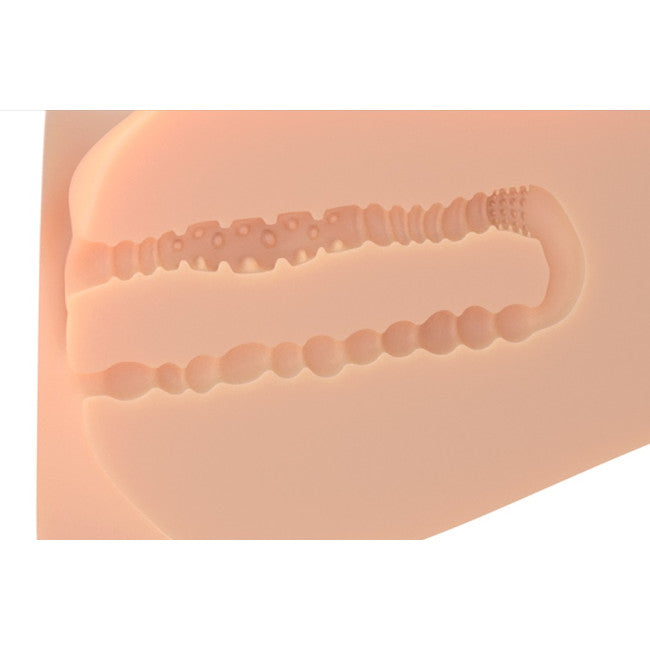 Textures internes gaufrées du buste masturbateur 2 en 1 pour sensations intenses
